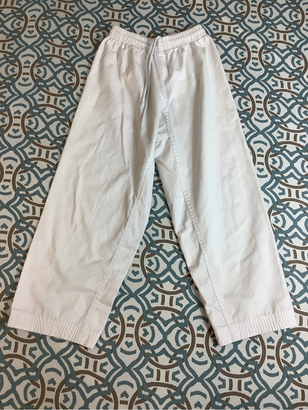 white unisex martial arts pants in size 2,